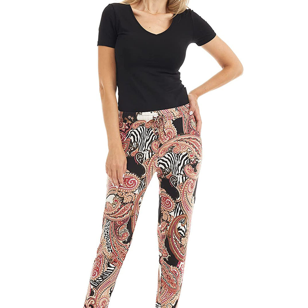 Bamboo wide-leg pyjama bottoms with elastic waistband, drawstring, and open bottom leg. Paisley Pattern is orange, red, black and white