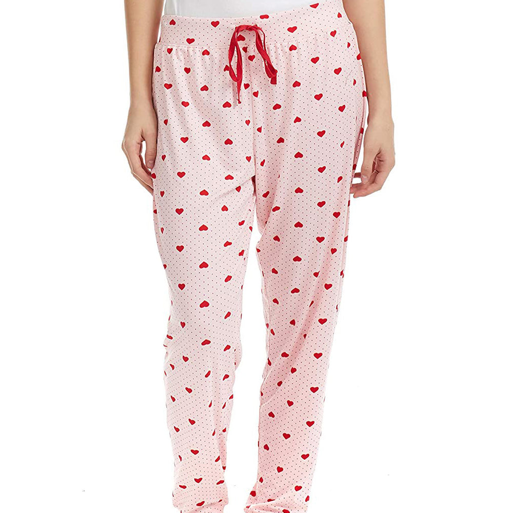 PJ joggers with soft velvety texture, stretch, elastic waistband, drawstring, and stylish ankle cuff. This pattern is small red hearts and dots, on a pink background
