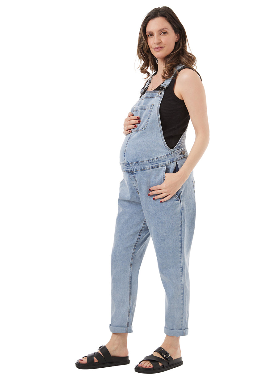 
                  
                    blue maternity overalls, with front pocket, side pockets, with fastening button at the waist to accomodate belly.
                  
                