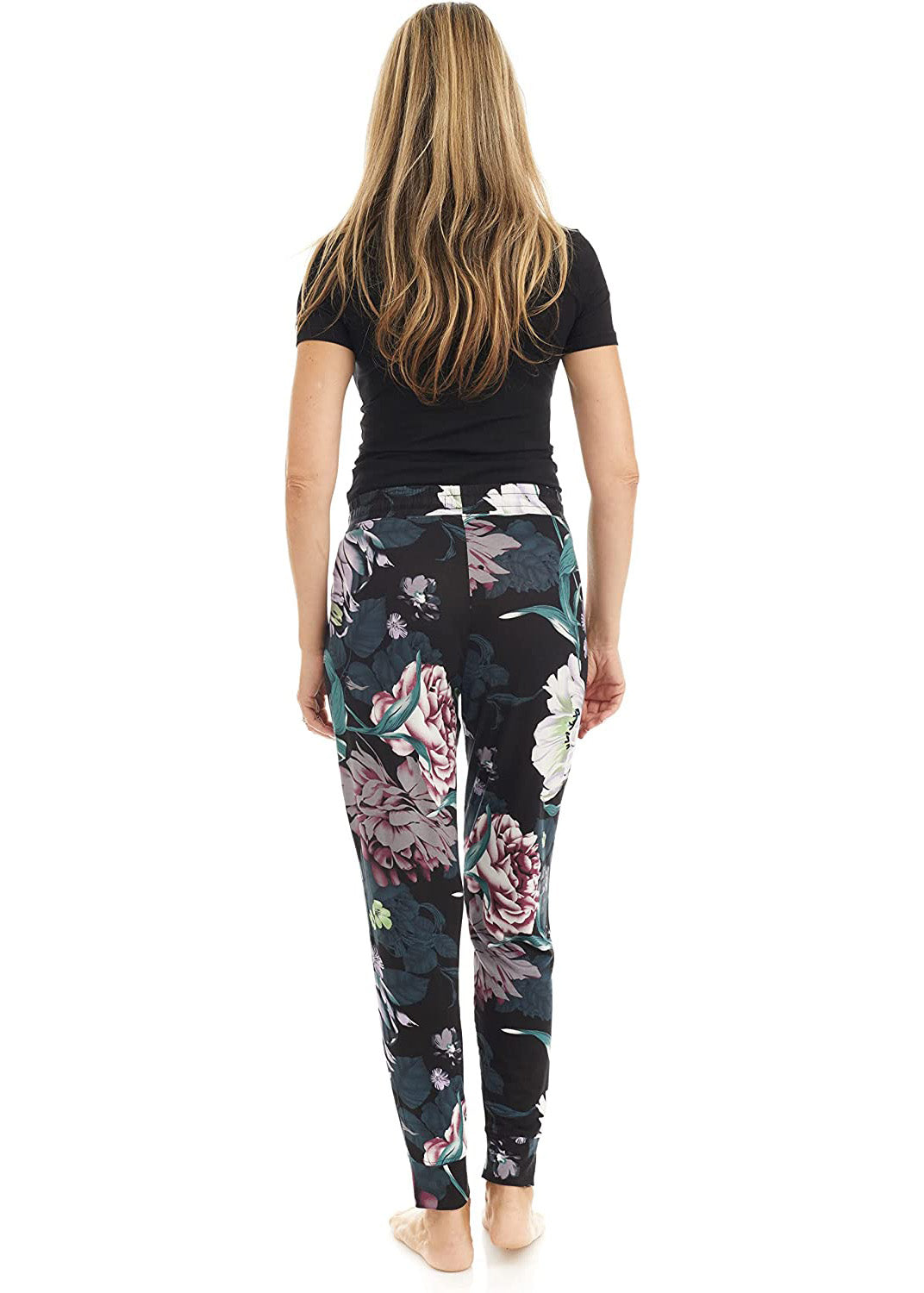 
                  
                    Bamboo wide-leg pyjama bottoms with elastic waistband, drawstring, and open bottom leg. flower pattern, main colors are green, purple, white, red.
                  
                