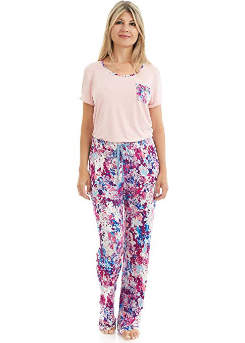 T Shirt and Pant Pajama set. The t-shirt is solid light pink. it has a pocket and a neck trim that matches the pattern on the pants. the pattern on the pants is a pink, white and blue flower pattern. 