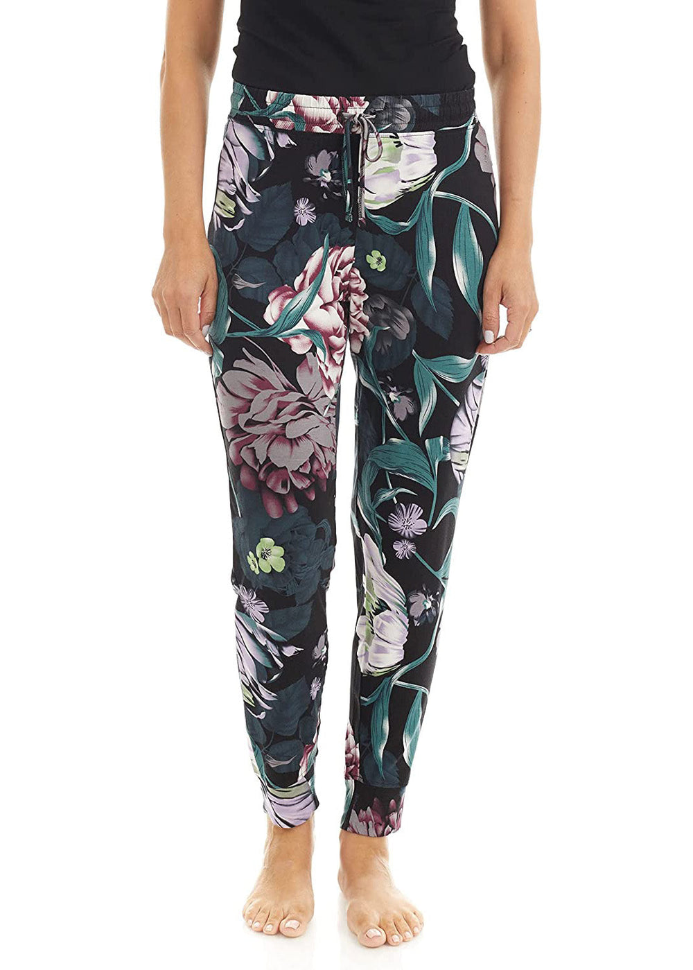 Bamboo wide-leg pyjama bottoms with elastic waistband, drawstring, and open bottom leg. flower pattern, main colors are green, purple, white, red, on black background