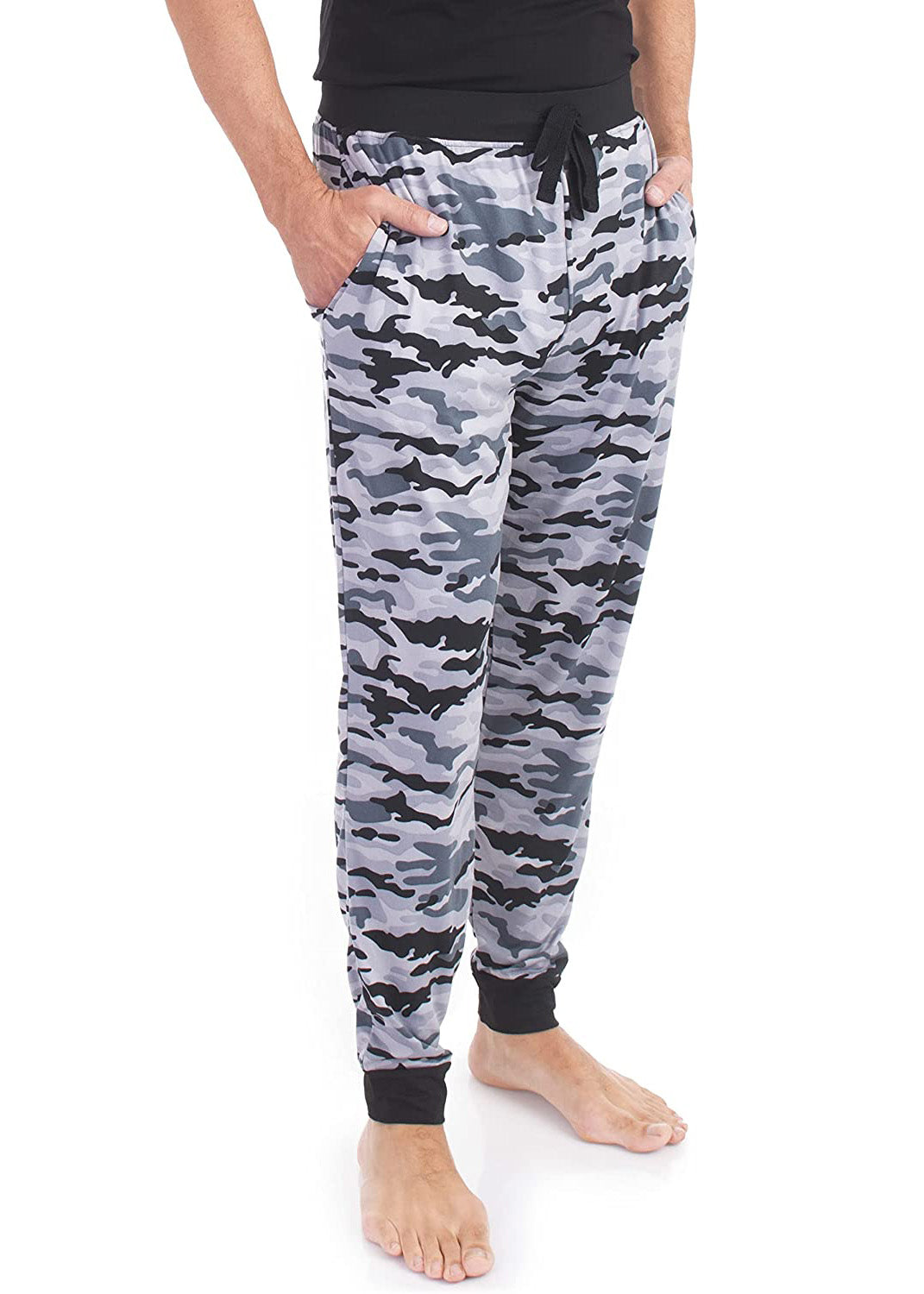 
                  
                    PJ joggers with soft velvety texture, stretch, elastic waistband, drawstring, and stylish ankle cuff. This pattern is a grey, black and white camo pattern. The waist and the cuffs are black.
                  
                