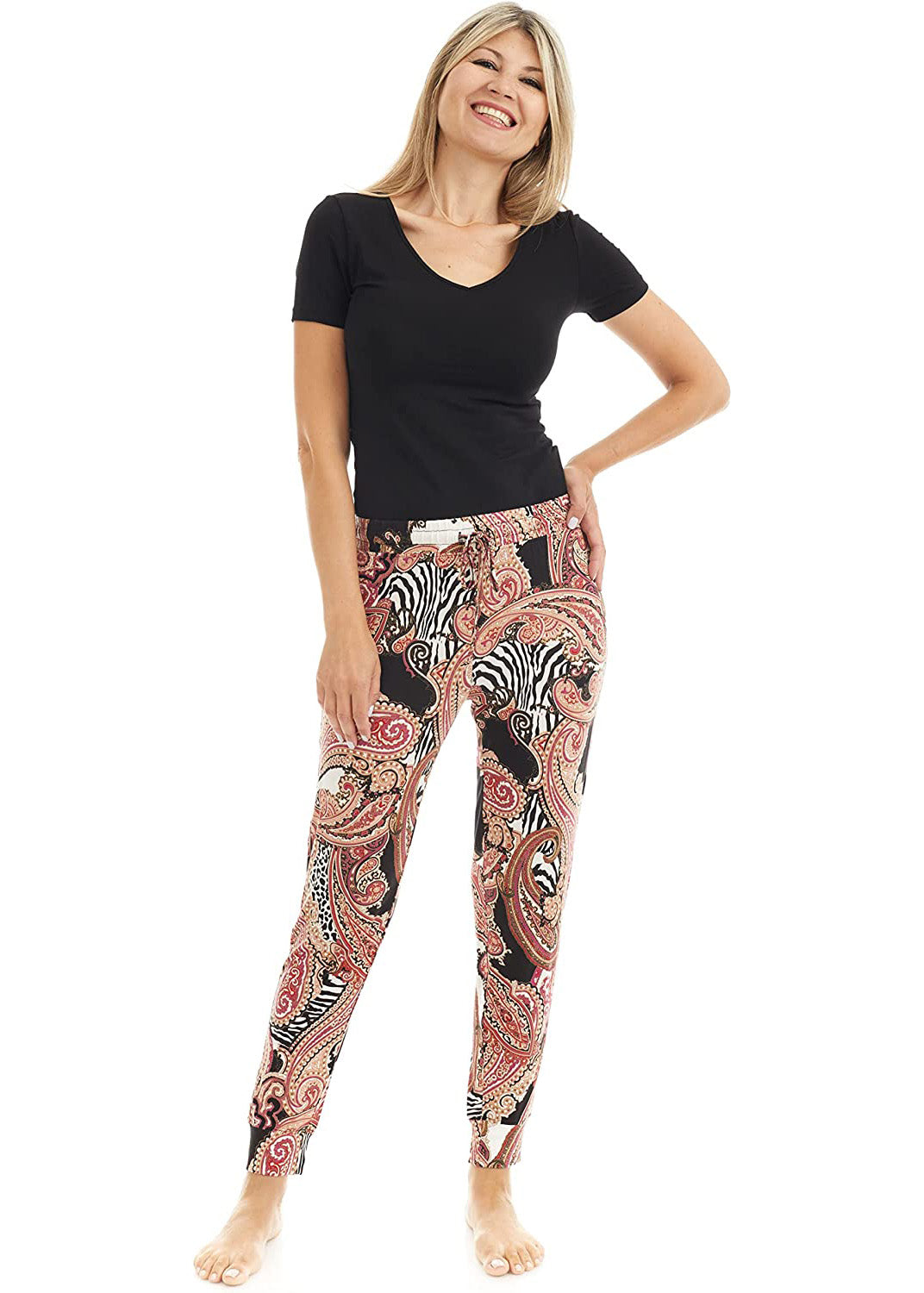 Bamboo wide-leg pyjama bottoms with elastic waistband, drawstring, and open bottom leg. Paisley Pattern is orange, red, black and white