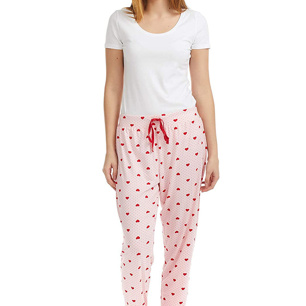 
                  
                    PJ joggers with soft velvety texture, stretch, elastic waistband, drawstring, and stylish ankle cuff. This pattern is small red hearts and dots, on a pink background
                  
                